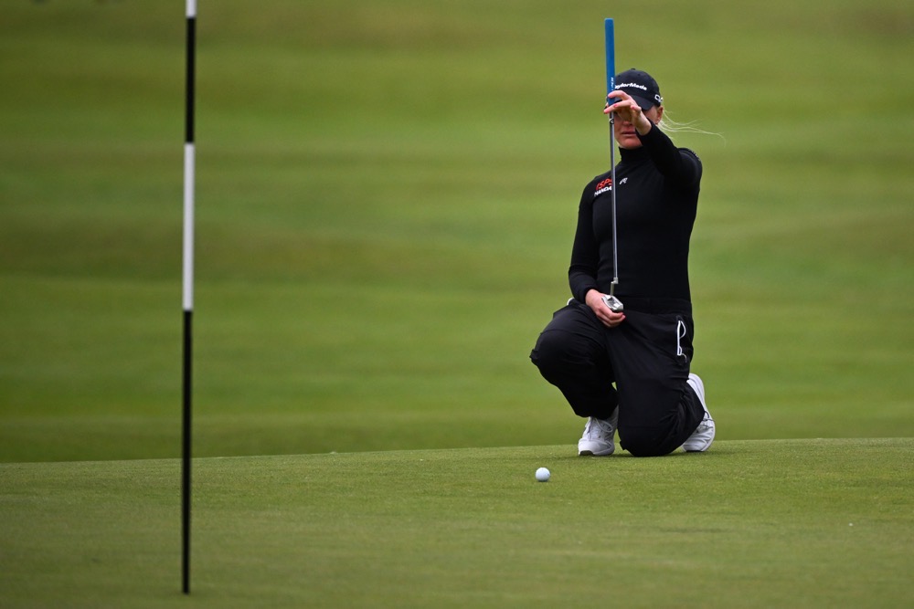 England’s Charley Hull lines up a putt on the 17th green on the opening day of the 2024 Women’s British Open Golf Championship, on the Old Course at St. Andrews on August 22, 2024. (AFP)