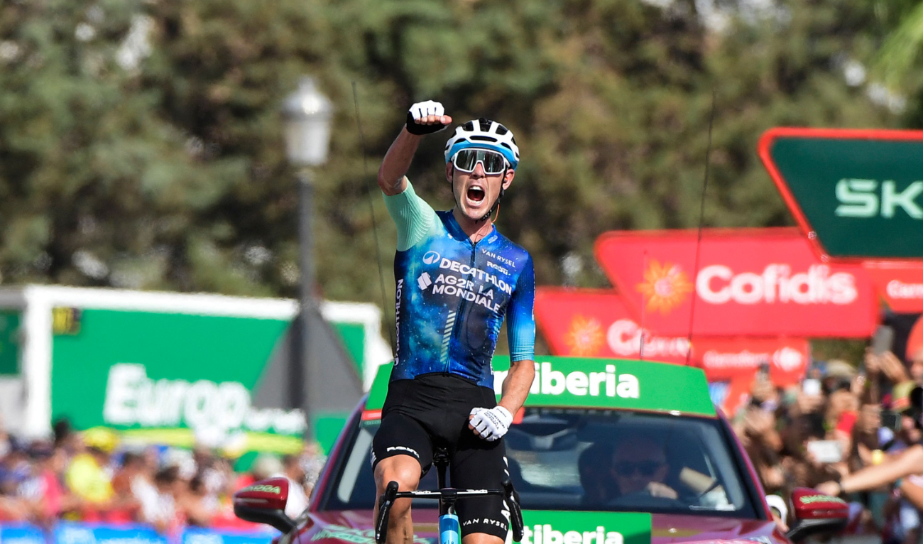 Team Decathlon-AG2R La Mondiale's Ben O'Connor celebrates crossing the finish line in first place at the end of the stage 6 of La Vuelta a Espana cycling tour, a 185.5 km race between Jerez de la Frontera and Yunquera, on Aug. 22, 2024. (AFP)