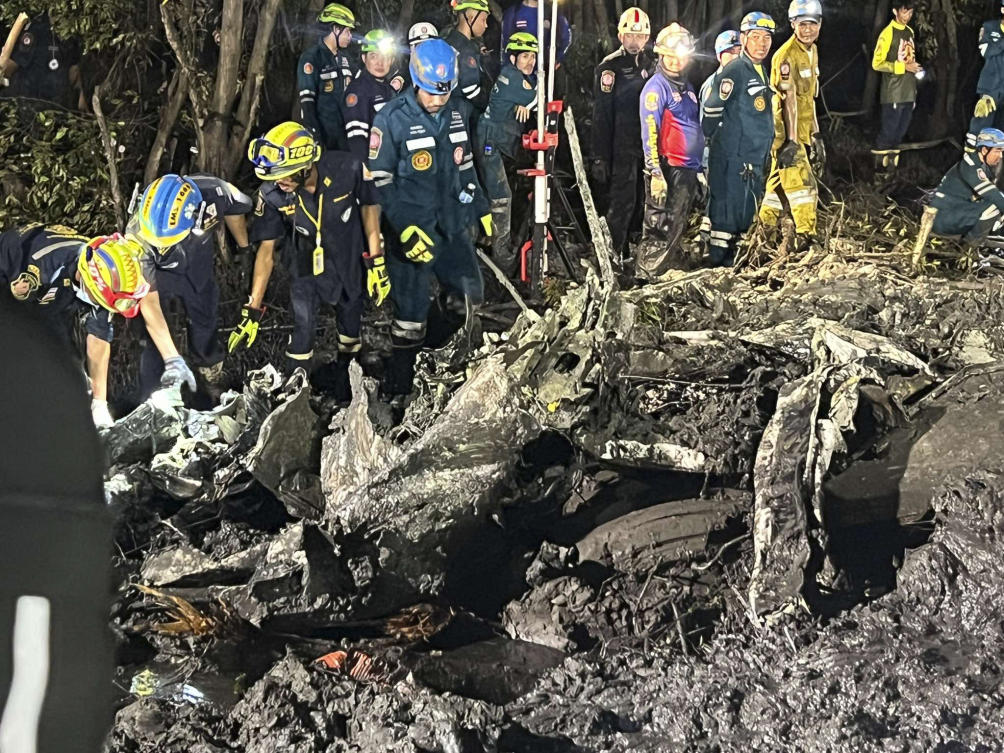 A rescue team works at a site of a small aircraft’s crash in Chachoengsao province, Thailand on Aug. 22, 2024. (Chachoengsao’s Public Relations Department via AP)