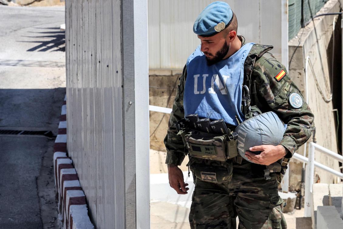 A peacekeeper of the Spanish Contingent walks at the United Nations Interim Force in Lebanon (UNIFIL) barracks near Khiam in southern Lebanon (AFP)