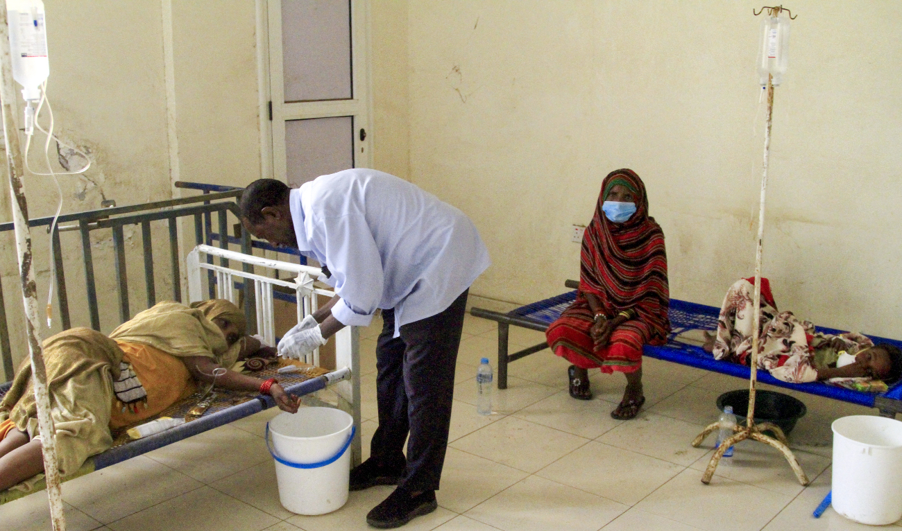 Patients suffering from cholera receive treatment at a rural isolation centre in Wad Al-Hilu in Kassala state in eastern Sudan, on August 17, 2024. (AFP)