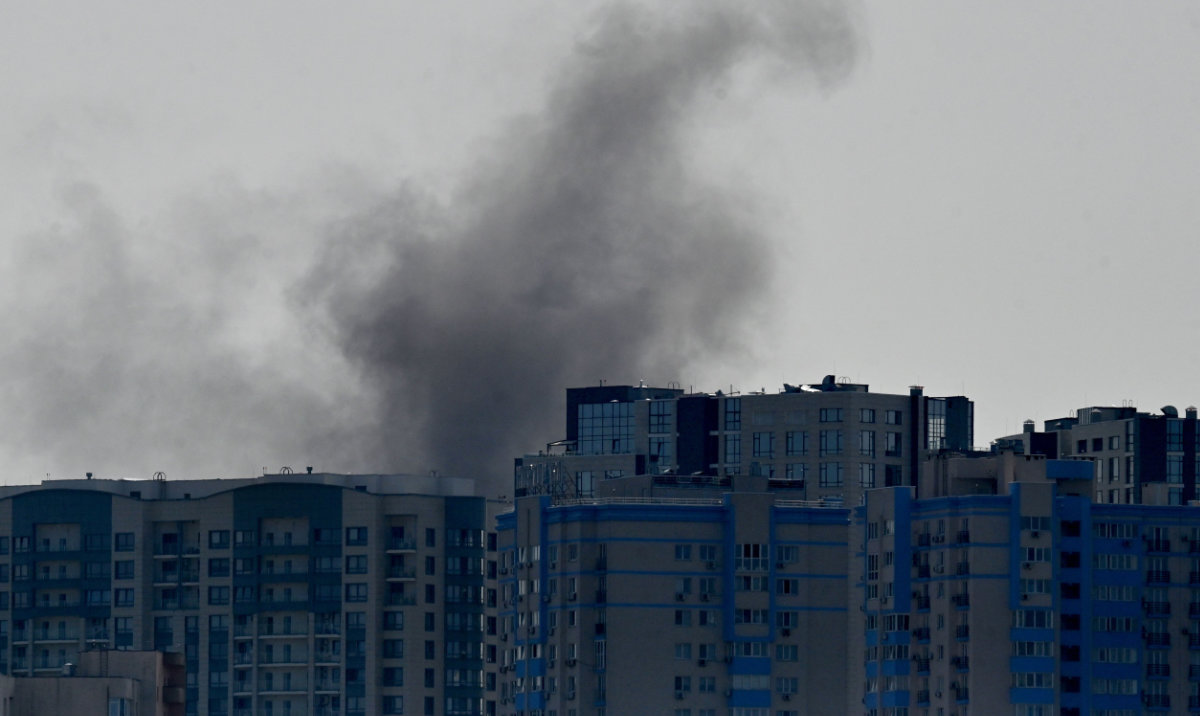 Smoke rises over buildings following a Russian attack in Kyiv, on August 26, 2024, amid the Russian invasion of Ukraine. (AFP)