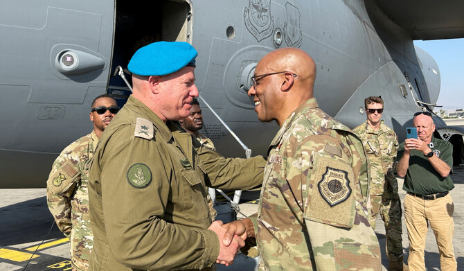 U.S. Air Force General Charles Q. Brown Jr., chairman of the Joint Chiefs of Staff, is greeted by an Israeli military official, at Ben Gurion International Airport outside Tel Aviv, Israel, on August 26, 2024. (REUTERS)