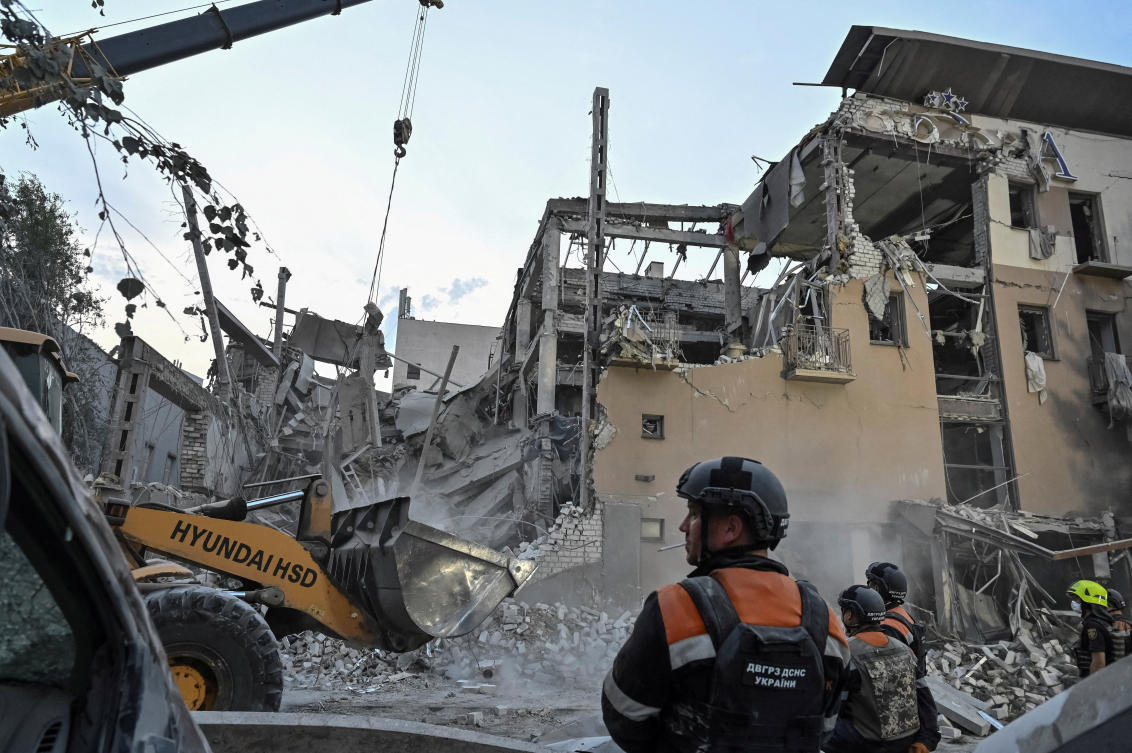 Rescuers work at a site of a Russian missile strike, amid Russia’s attack on Ukraine, in Kryvyi Rih, Ukraine. (REUTERS)