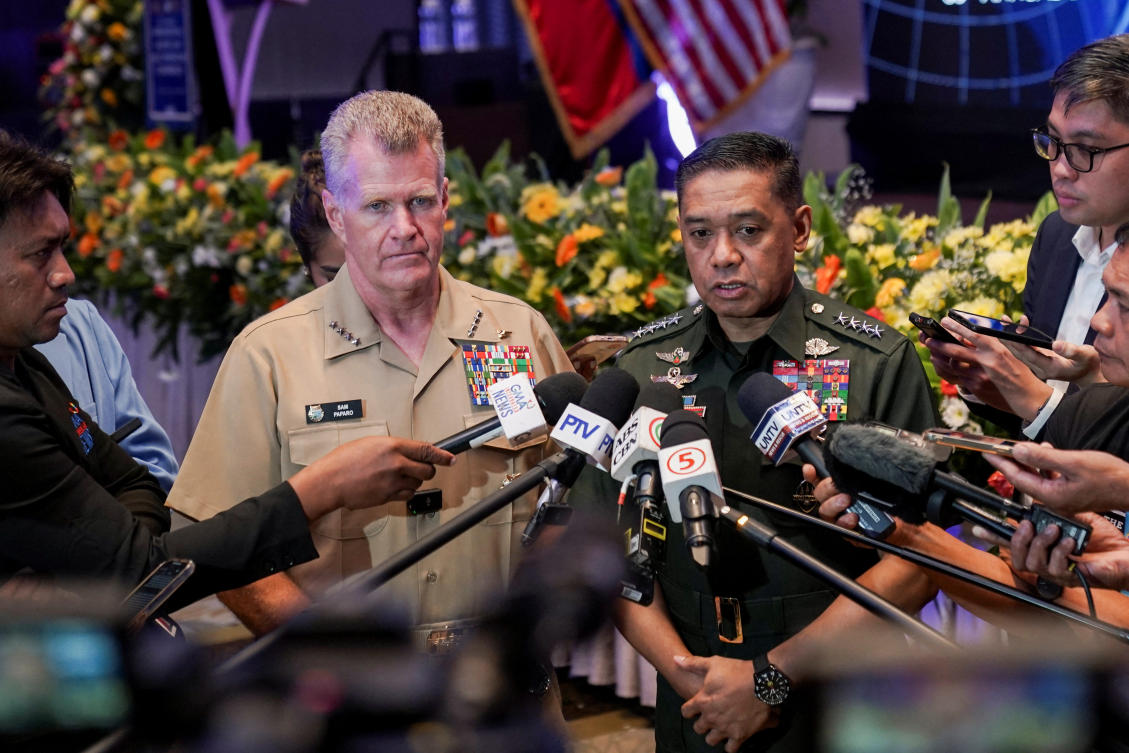 US Indo-Pacific Command Admiral Samuel Paparo and Philippines Army Chief of Staff Romeo Brawner Jr speak to the media during the International Military Law and Operations Conference (MILOPS), in Manila, Philippines, August 27, 2024. (Reuters)