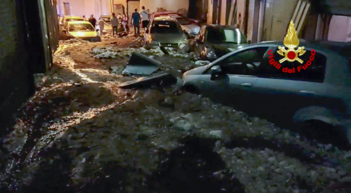 In this image taken from a video released by the Italian firefighters on Wednesday, Aug. 28, 2024, cars are trapped in a river of mud in San Felice a Cancello, near Caserta, southern Italy, hit by torrential rains and cloudbursts since late yesterday afternoon.(AP)