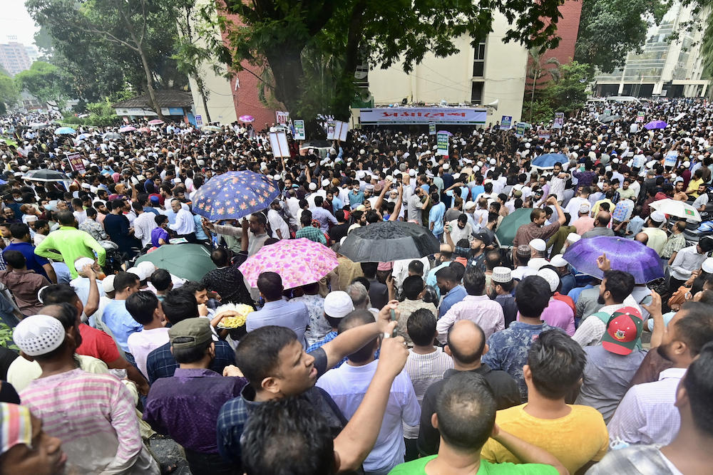Members of Bangladesh’s Jamaat-e-Islami party gather during a protest rally in Dhaka on June 10, 2023 to demand the release of their leaders. (AFP)
