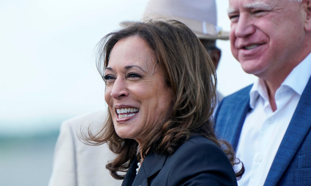 Democratic presidential nominee and US Vice President Kamala Harris and vice presidential nominee Tim Walz react at Savannah/Hilton Head International Airport in Savannah, Georgia, US, August 28, 2024. (Reuters)