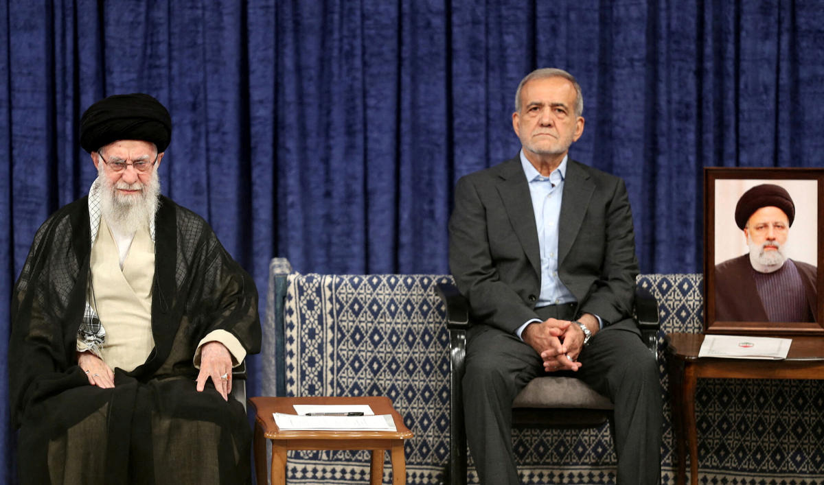 Iran’s President Masoud Pezeshkian, seen here with Supreme Leader Ayatollah Ali Khamenei, ordered the interior minister to form a committee to investigate the death of a defendant while in custody in the northern city of Lahijan. (WANA via Reuters)