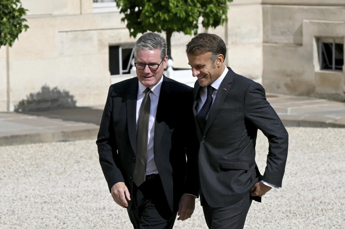 French President Emmanuel Macron receives Britain’s Prime Minister Keir Starmer before their meeting, Thursday, Aug. 29, 2024 at the Elysee Palace in Paris. (AP)