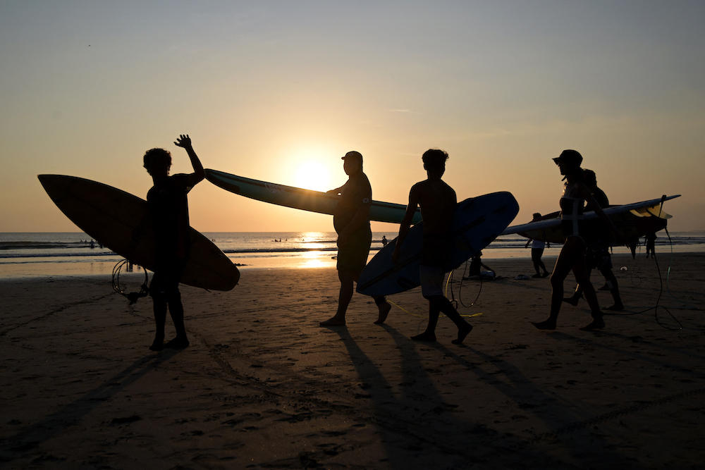 Data from Indonesia’s statistics bureau shows that 2.9 million foreign visitors entered the island through Bali airport in the first half of this year. Above, foreign tourists on Kuta beach near Denpasar on Indonesia’s Bali island. (AFP)