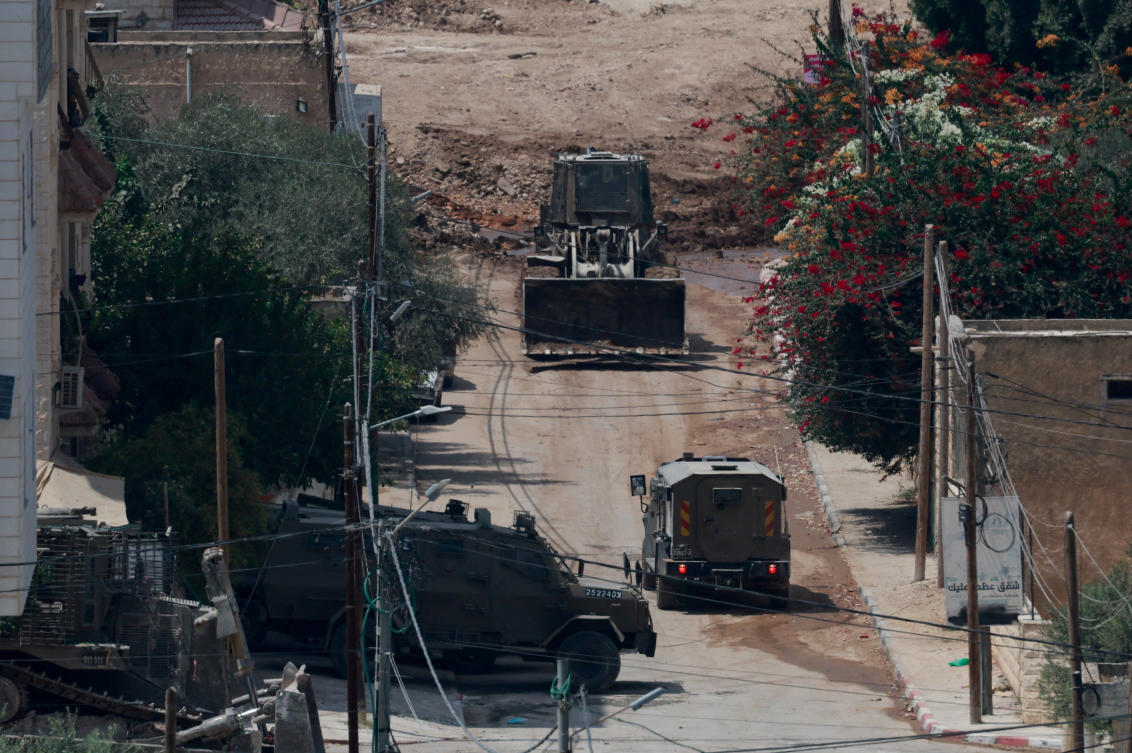 Security forces vehicles operate during an Israeli raid in Jenin, in the Israeli-occupied West Bank. (Reuters)