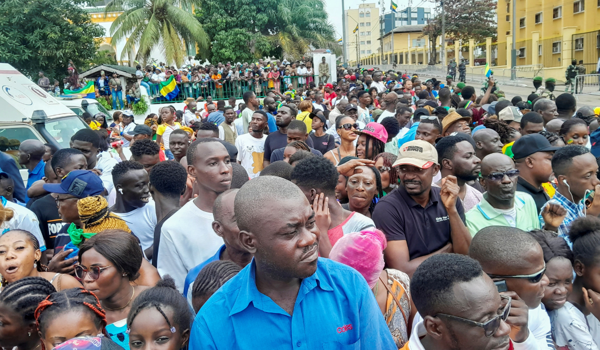 People attend the celebrations in Libreville, marking the first anniversary of the ouster of Gabon’s President Ali Bongo. (Reuters)