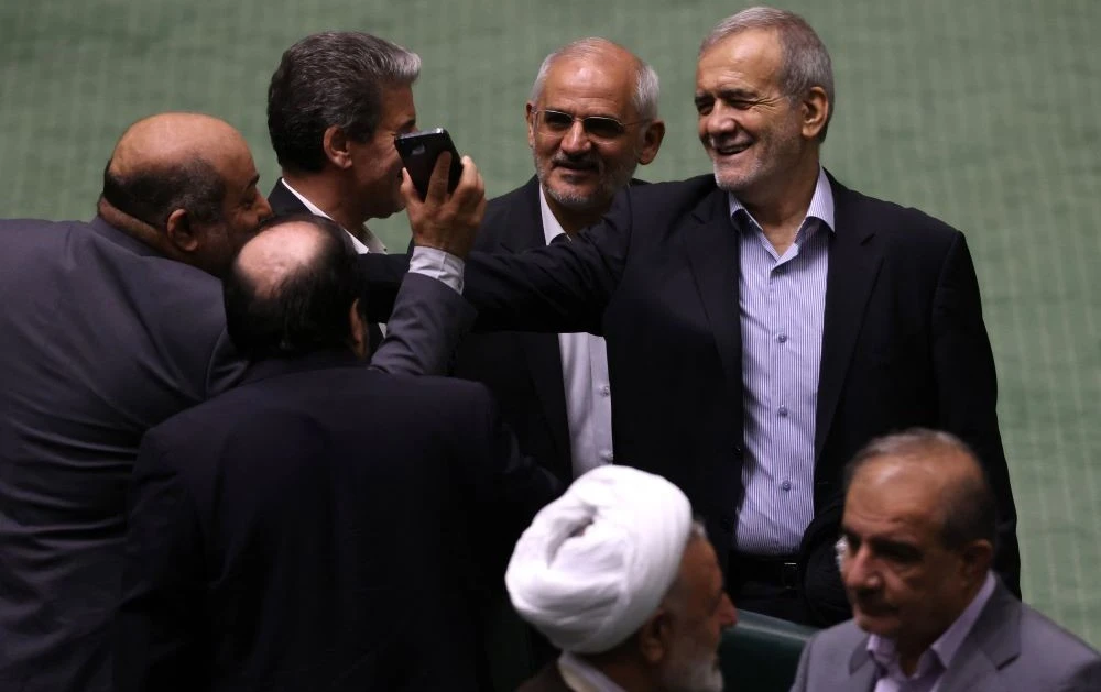 Masoud Pezeshkian arrives to deliver a speech to members of parliament, Tehran, Iran, Aug. 17, 2024. (AFP)