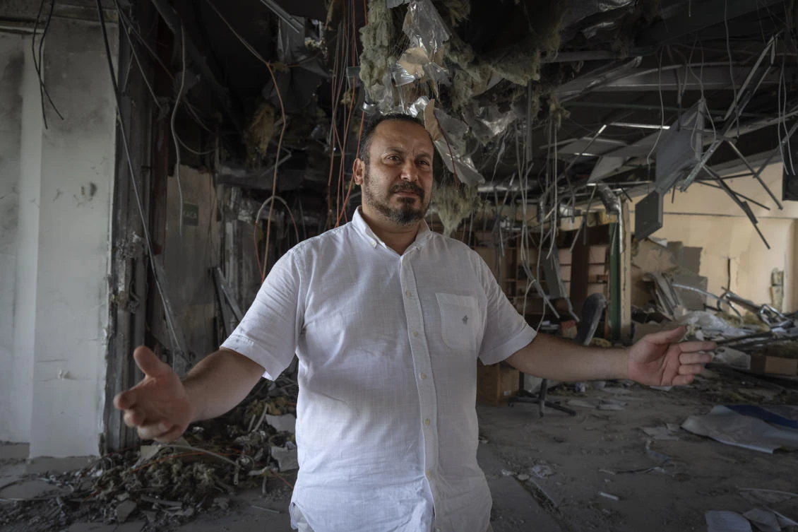 Alya Gali, a Gaza Strip-born doctor, shares memories amid debris in Kyiv, Ukraine, Monday, July 22, 2024 two weeks after a missile killed nine as it hit a private clinic where he has worked for most of his professional life.(AP)