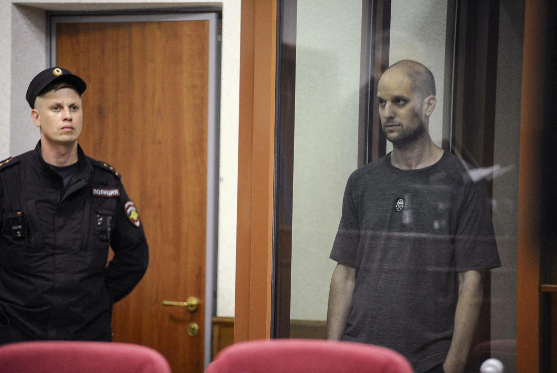 Wall Street Journal reporter Evan Gershkovich, right, was convicted of espionage on July 19 and handed 16 years in jail. (Reuters)