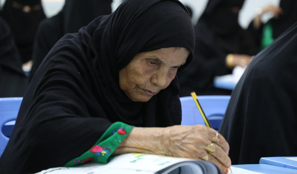 Shaqraa Tohari, 105, enrolled at Al-Dabra educational center in Ahad Al-Masarihah, reflecting her strong desire to learn reading and writing. (Supplied)