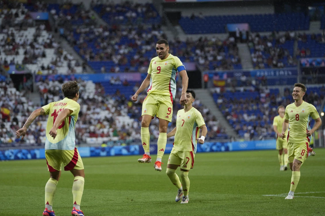 Spain’s Abel Ruiz, center, celebrates with teammates after scoring his side’s third goal during their quarter final match against Japan at the Lyon stadium, during the 2024 Summer Olympics, on Aug. 2, 2024, in Decines, France. (AP)