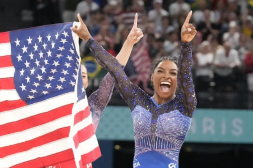 Simone Biles earned her seventh Olympic gold medal by soaring to victory in the women's vault final at the Paris Games on Saturday. (AP)