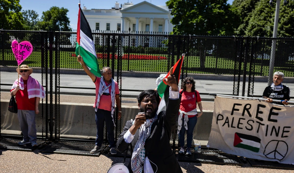 A pro-Palestinian activist leads chants in front of the White House during a demonstration protesting the war in Gaza on June 8, 2024 in Washington, DC. (AFP/File)