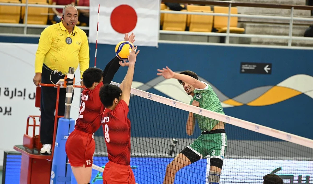 Pakistani and Japanese players jump to block the ball during the Pakistan vs Japan match at the Asian Men’s U18 Volleyball Championship in Bahrain on August 4, 2024. (@AsianVolleyball/X)