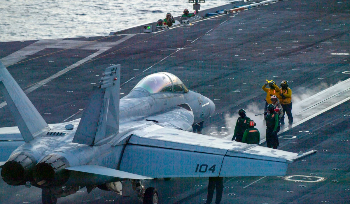 In this photograph released by the U.S. Navy, an F/A-18 Super Hornet prepares to launch off the flight deck of the Nimitz-class aircraft carrier USS Theodore Roosevelt July 5, 2024, in the South China Sea. (AP)