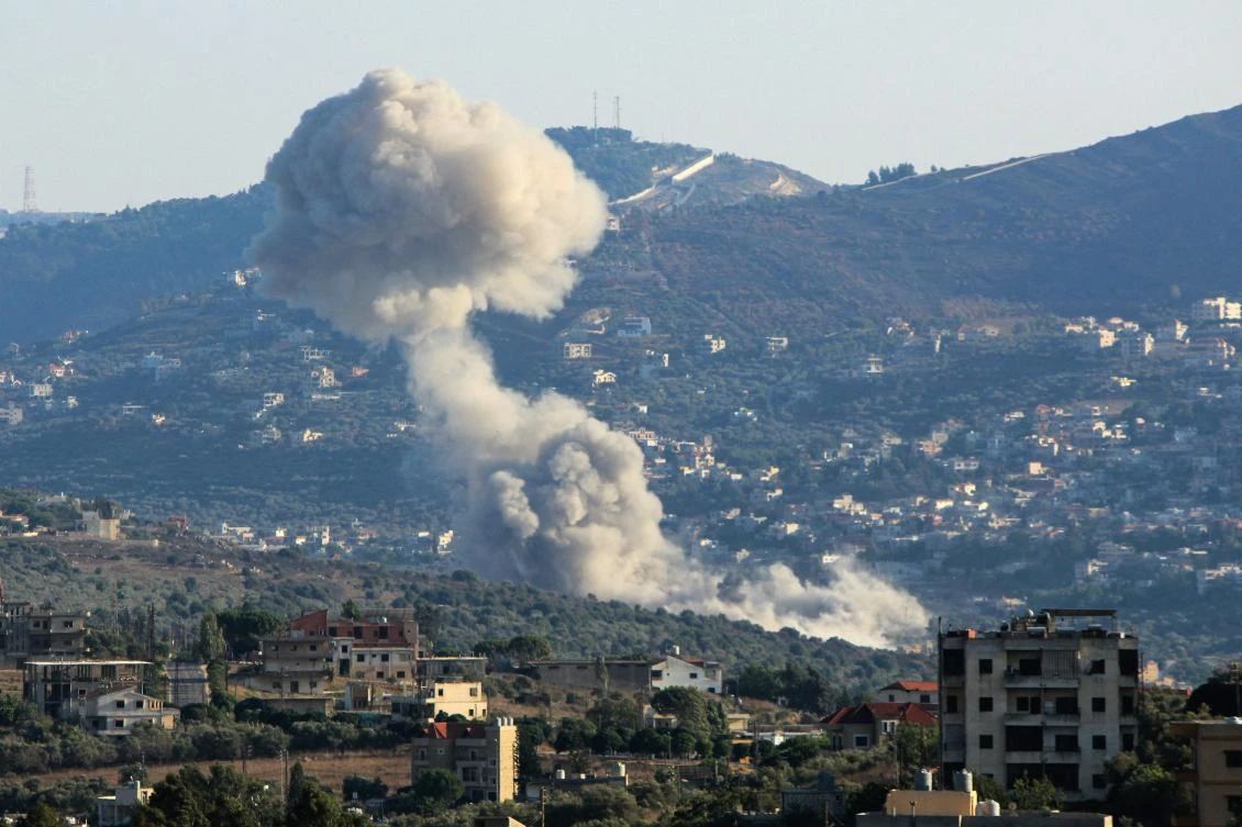 Smoke billows from the site of an Israeli strike on the southern Lebanese village of Kfar Kila on Aug. 6, 2024. (AFP)