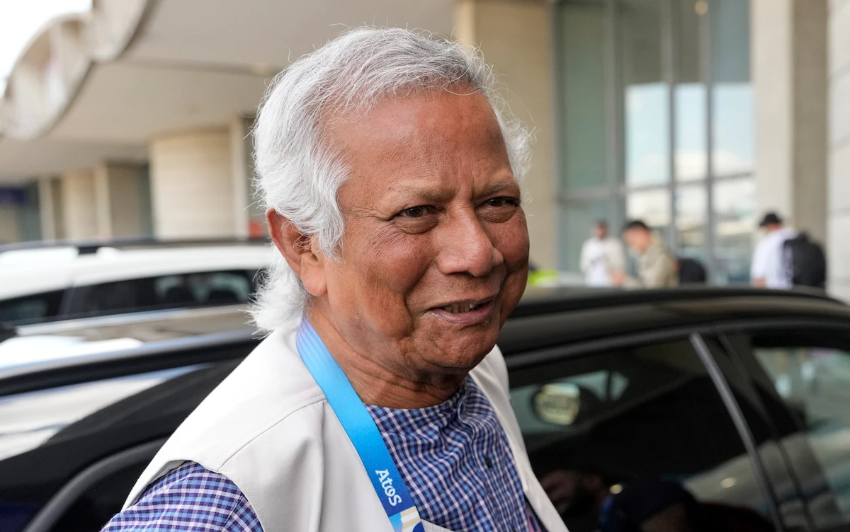 Nobel laureate Muhammad Yunus smiles upon his arrival at Charles de Gaulle’s airport in Roissy, north of Paris, Wednesday, Aug. 7, 2024. (AP)