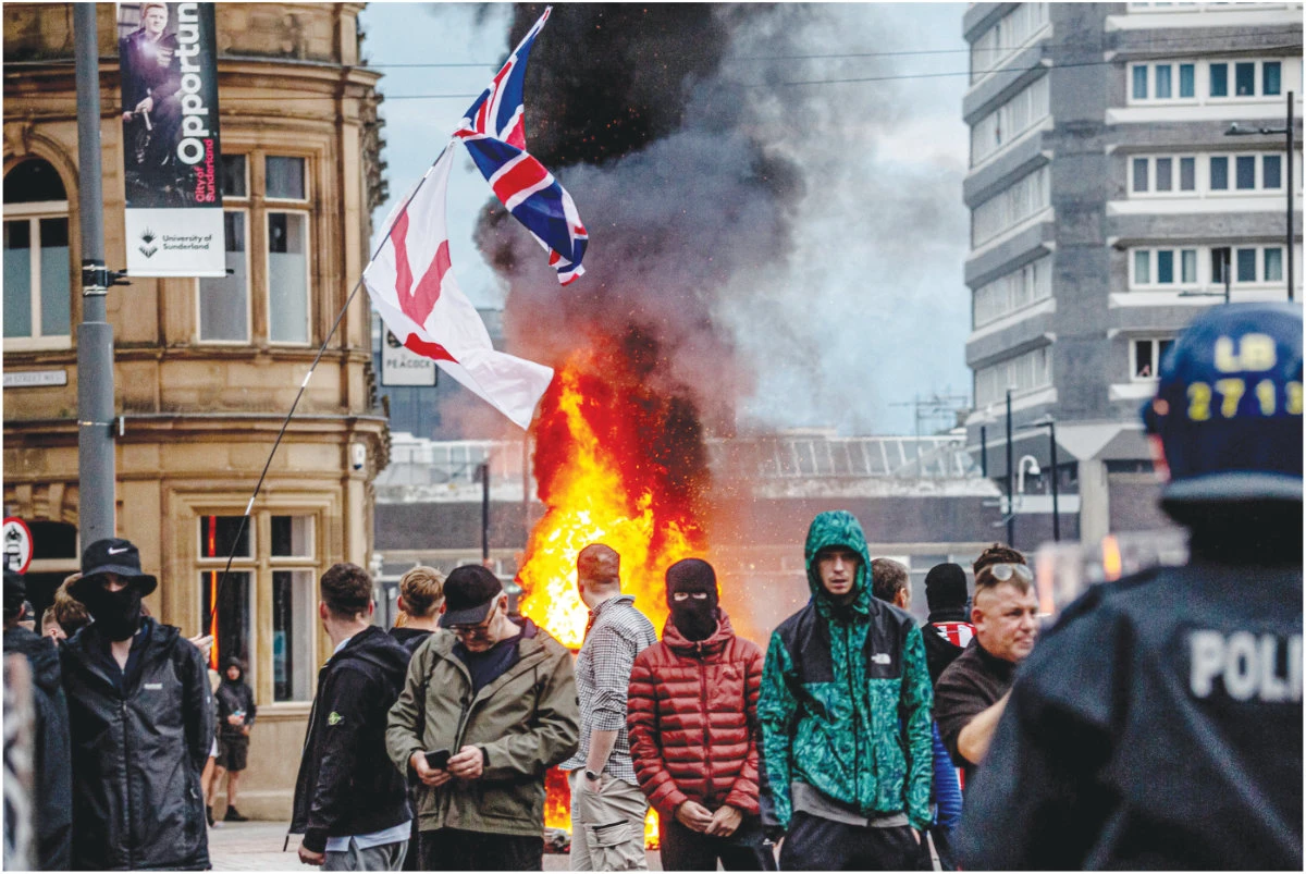 Rioters have looted shops, torched cars, targeted mosques, and even set fire to hotels housing asylum seekers. (Getty Images)