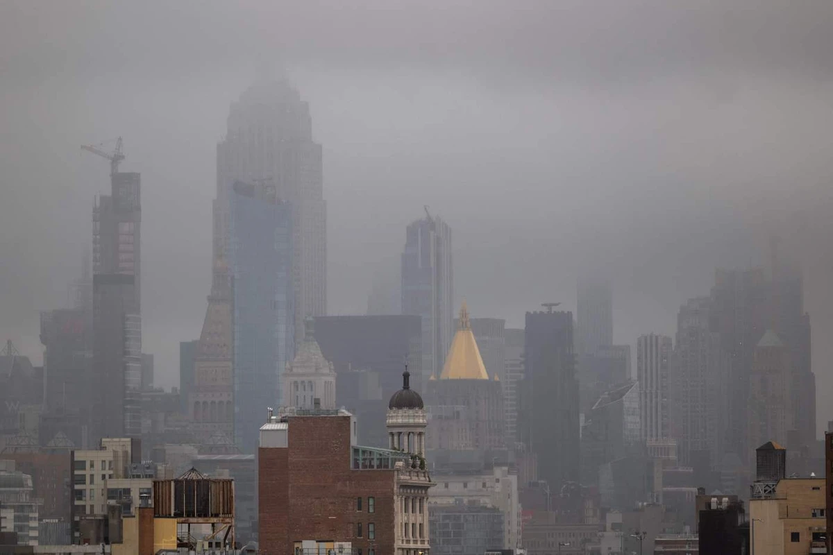 Midtown Manhattan sits under a layer of heavy clouds on August 09, 2024, in New York City. (AFP)