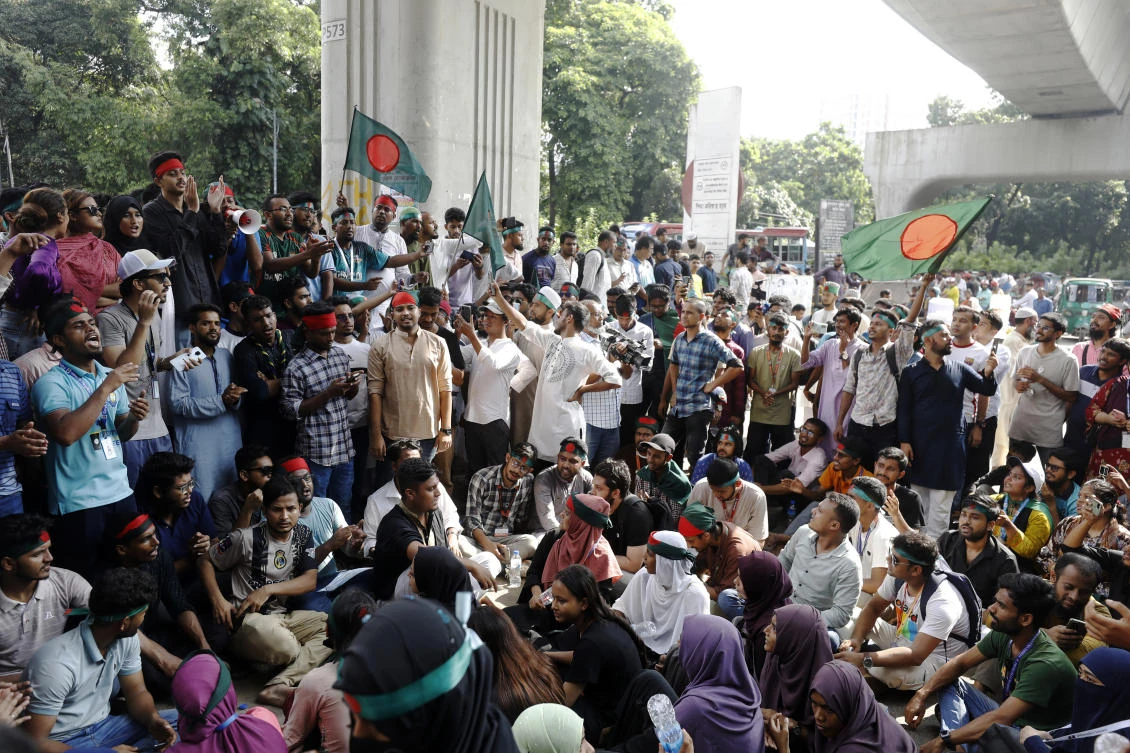 Students shout slogans as they demand the resignation of Bangladesh’s Chief Justice Obaidul Hassan and other senior judges during a public protest in Dhaka on Aug. 10, 2024. (AP)