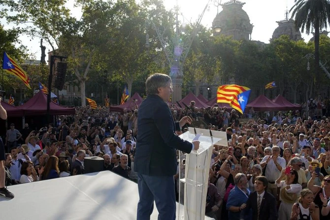 Catalan independence leader and former President Carles Puigdemont addresses supporters after his arrival near the Catalan parliament to attend the investiture debate in Barcelona on Aug. 8, 2024. (AP)