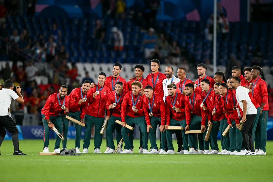 Morocco’s bronze medallists pose for a photograph with their medals after the men’s final football match between France and Spain during the Paris 2024 Olympic Games at the Parc des Princes in Paris. (File/AFP)