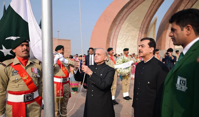 Prime Minister Shehbaz Sharif hoists Pakistan's national flag at the Pakistan Monument in Islamabad on August 14, 2024. (Photo courtesy: @CMShehbaz/X)