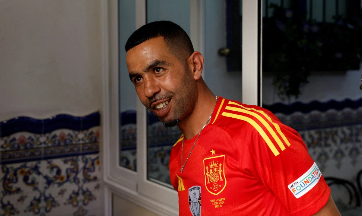Mounir Nasraoui, father of soccer player Lamine Yamal, smiles in Bar El Cordobes at Rocafonda neighbourhood in Mataro, north of Barcelona, Spain, July 11, 2024. (Reuters)