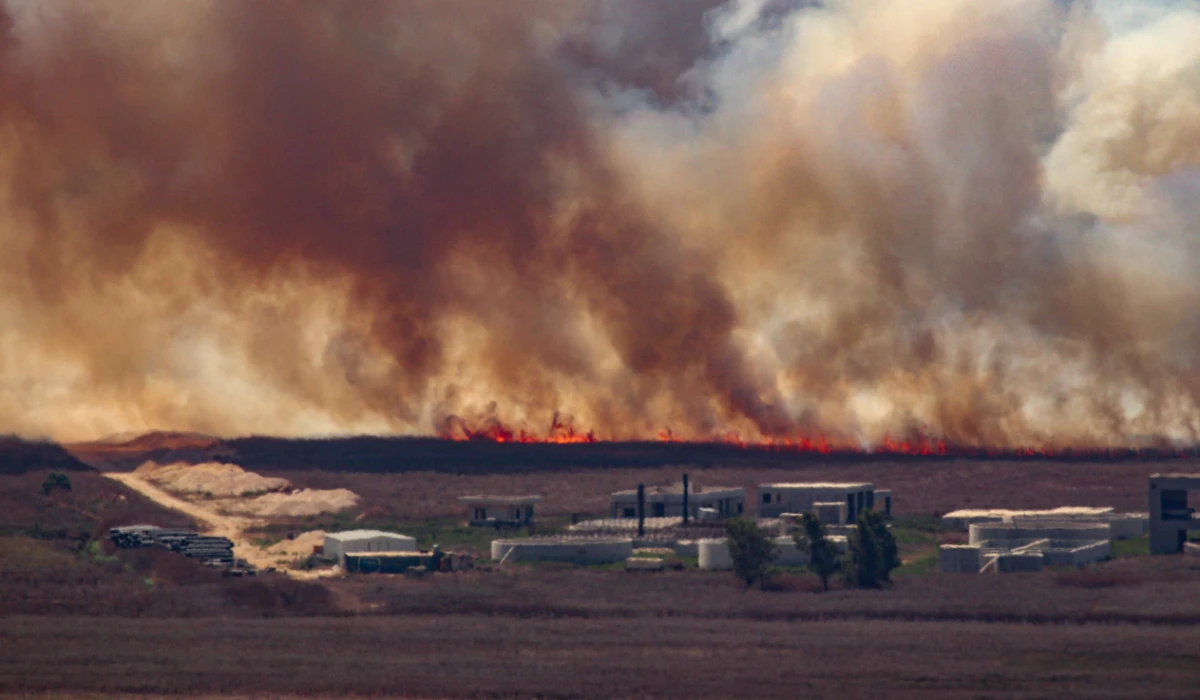 Fire sweep over the Marjayoun plain in southern Lebanon near the border with Israel after being hit by Israeli shelling on August 16, 2024, amid the ongoing cross-border clashes between Israeli troops and Hezbollah fighters. (AFP)