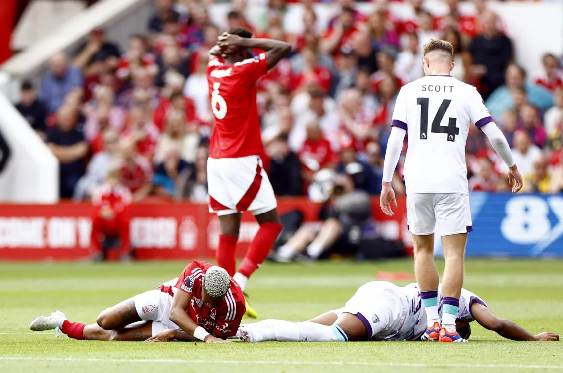 Nottingham Forest’s Danilo reacts after sustaining an injury during a challenge against AFC Bournemouth’s Antoine Semenyo during their Premier League match at The City Ground, Nottingham, on Aug. 17, 2024. (Reuters)