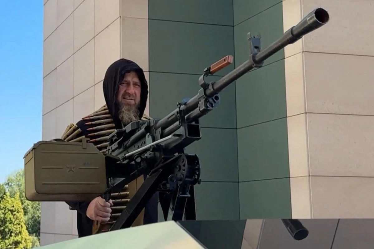 In this image from video posted by Chechen leader Ramzan Kadyrov's Telegram channel on Aug. 17, 2024, Kadyrov drives a Tesla Cybertruck equipped with a machine gun in Grozny, Chechnya. (Ramzan Kadyrov Telegram channel via AP)