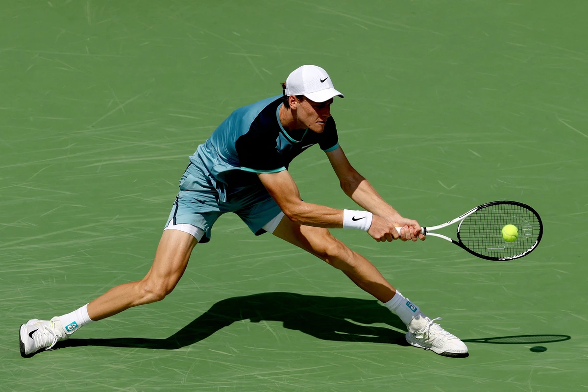 Jannik Sinner of Italy returns a shot to Andrey Rublev of Russia during Day 7 of the Cincinnati Open at the Lindner Family Tennis Center on Saturday in Mason, Ohio. (Getty Images North America / AFP)