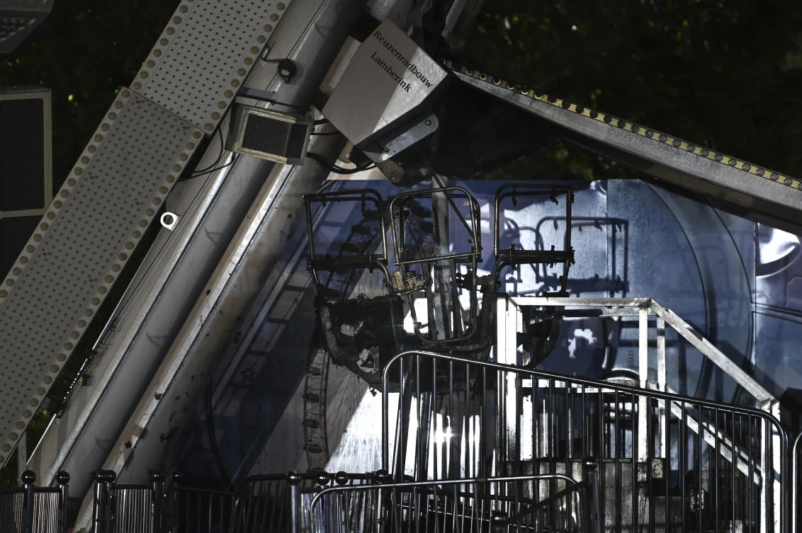 A burnt-out gondola of the Ferris wheel after a fire broke out on the Ferris wheel at the Highfield Festival near Leipzig, Germany, Sunday, Aug. 18, 2024. (AP)