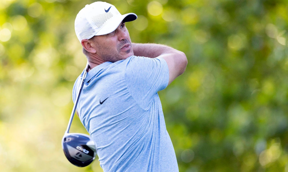 Captain Brooks Koepka, of Smash GC, hits from the 17th tee during the final round of LIV Golf Greenbrier at The Old White at The Greenbrier, Sunday, Aug. 18, 2024, in White Sulphur Springs, W.Va. (AP)