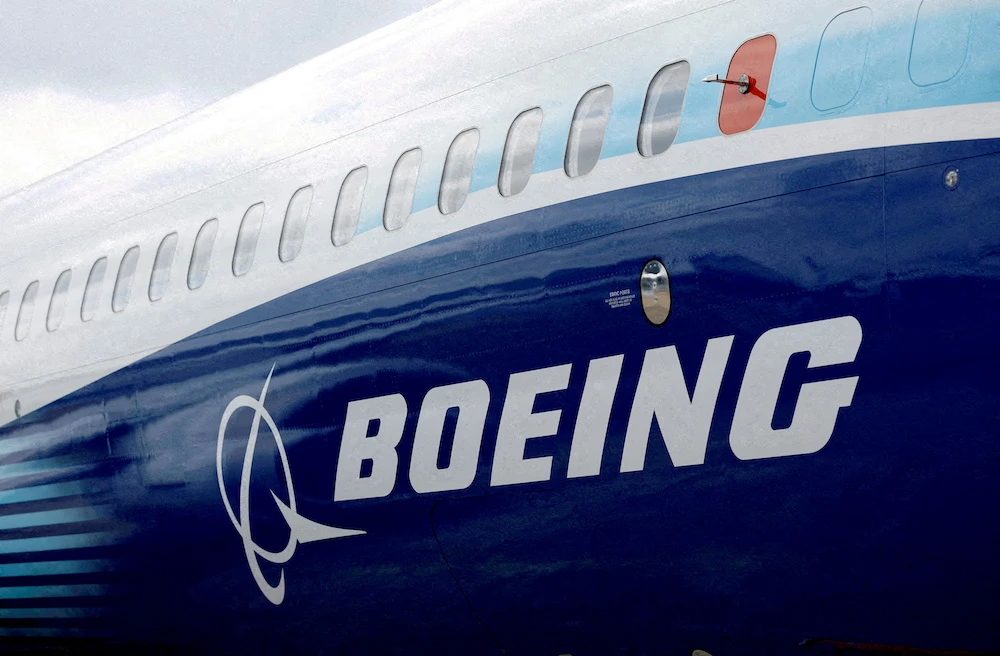 The Boeing logo is seen on the side of a Boeing 737 MAX at the Farnborough International Airshow, in Farnborough, Britain. File/Reuters