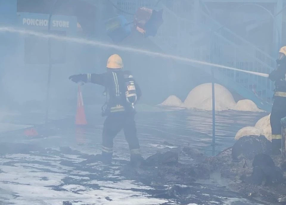 Saudi Civil Defense personnel extinguish a fire that broke out at a closed entertainment complex in Jeddah’s Ash Shati district. (@SaudiDCD)