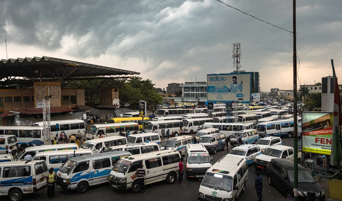 Busses are seen at the Bujumbura main taxi rank before the Security minister Gervais Ndirakobuca is appointed as the new Burundi Prime Minister in Bujumbura on September 7, 2022. (AFP/File)