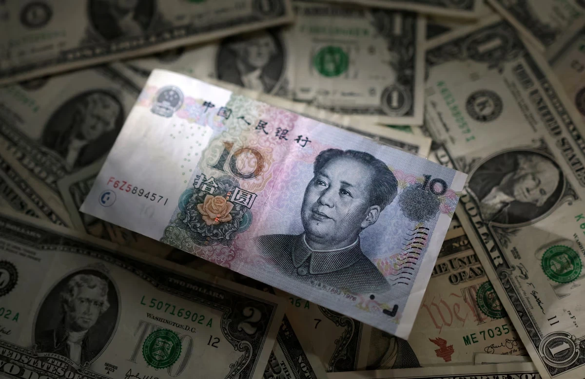 Recent discussions about China paying for Saudi oil in renminbi have heightened expectations that a significant portion of the massive oil trade might soon be denominated in the Chinese currency. Reuters/File