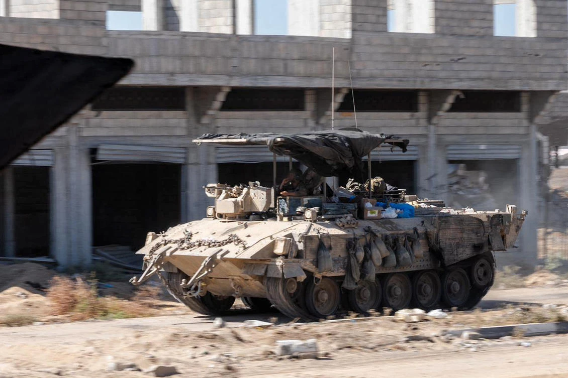 This handout picture released by the Israeli army on August 22, 2024 reportedly shows an Israeli infantry fighting vehicle (IFV) moving during operations operating in the Gaza Strip. (AFP)
