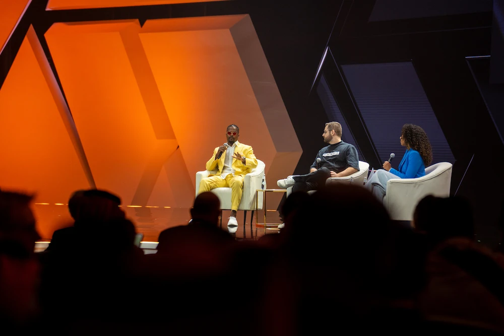 Patrice Evra (pictured in yellow), a UEFA Champions League and five-time Premier League winner with Manchester United, spoke as a panelist at the NGSC, a two-day conference being held at the Four Seasons Hotel Riyadh. (AN Photo/Abdulraham Shalhoub)