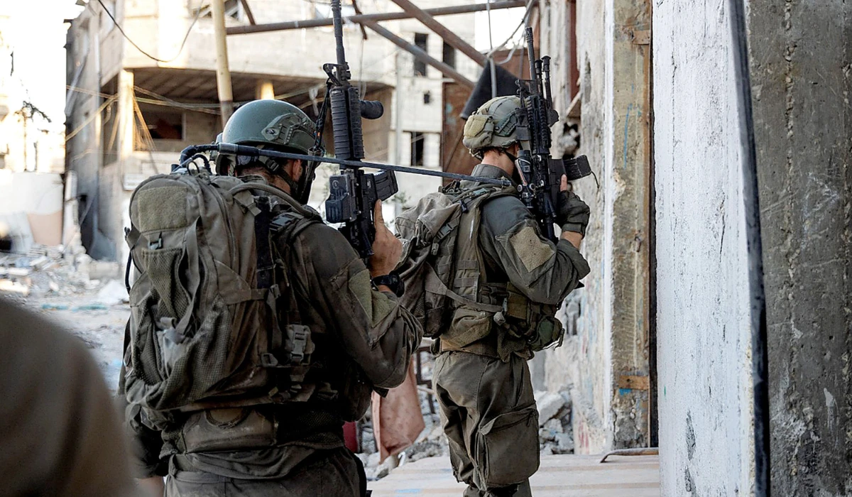 This handout picture released by the Israeli army on August 23, 2024 reportedly shows Israeli soldiers operating in the Gaza Strip. (AFP)