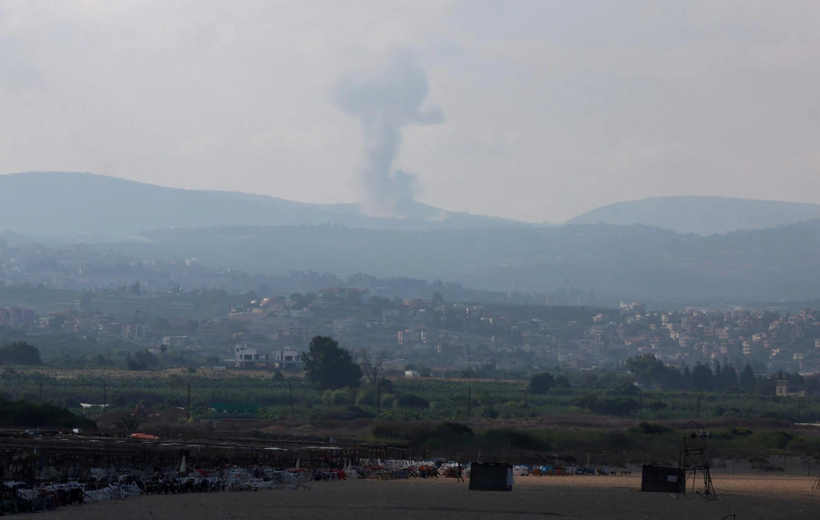 A view shows smoke on the Lebanese side of the border with Israel, amid ongoing cross-border hostilities between Hezbollah and Israeli forces, as seen from Tyre, southern Lebanon August 25, 2024. (Reuters)