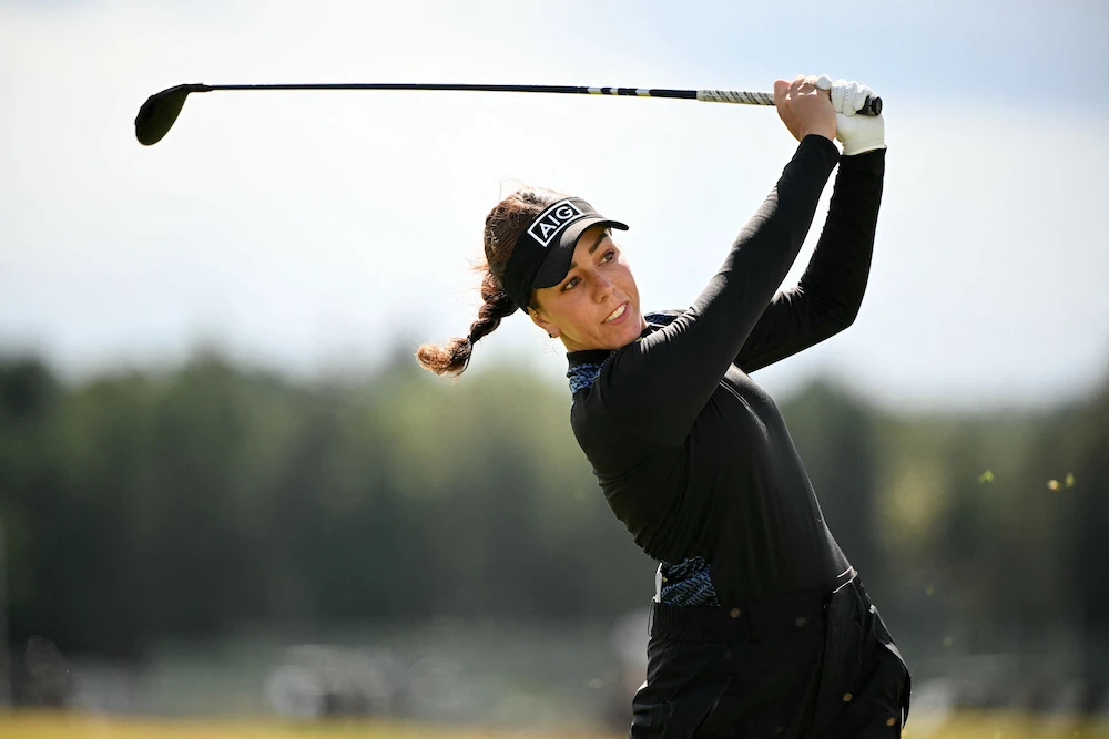 File photo shows England’s Georgia Hall hitting a drive from the 4th tee on day three of the 2024 Women’s British Open Golf Championship, on the Old Course at St. Andrews, in St. Andrews, Scotland, on Aug. 24, 2024. (AFP)